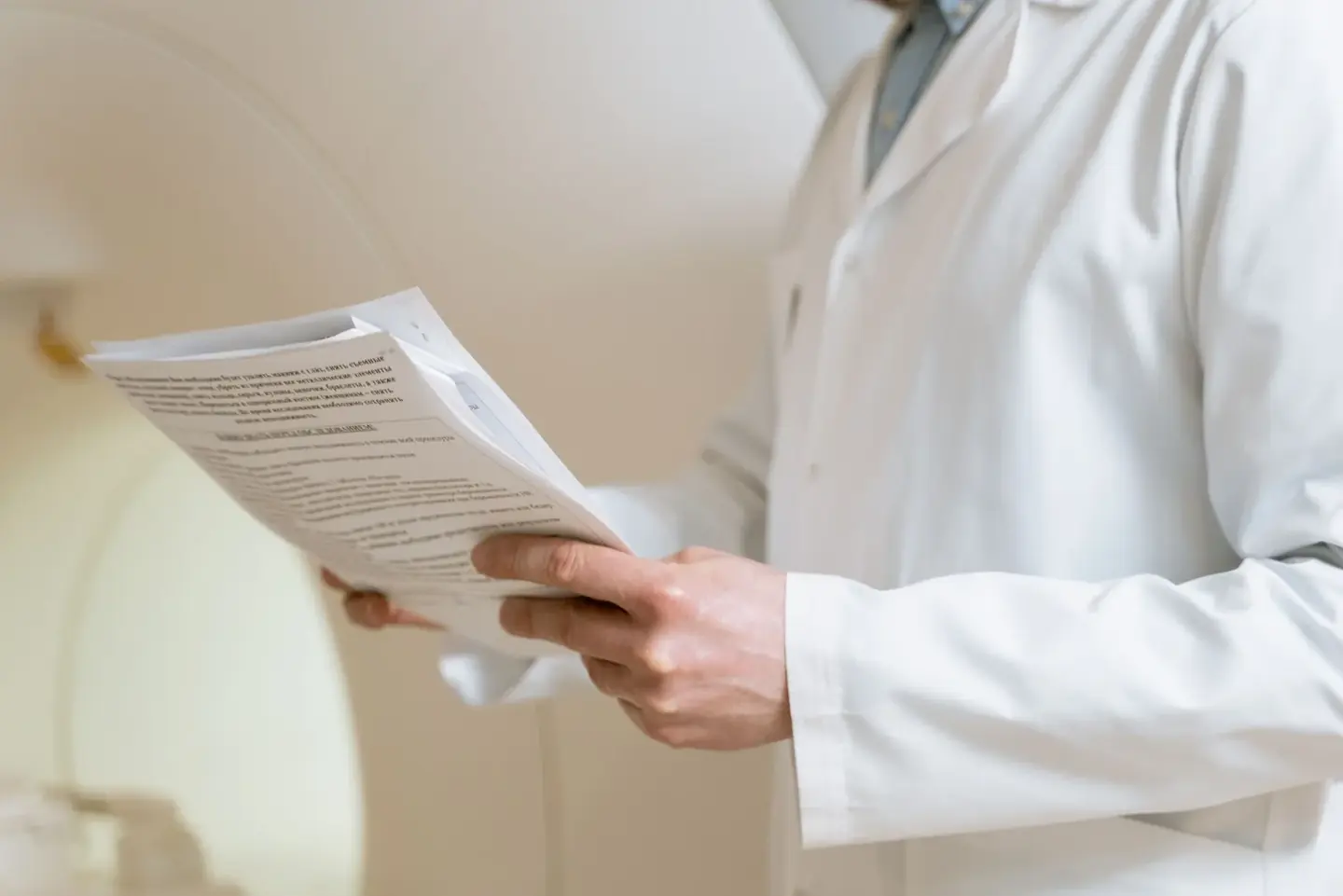 A clinician reviewing a report